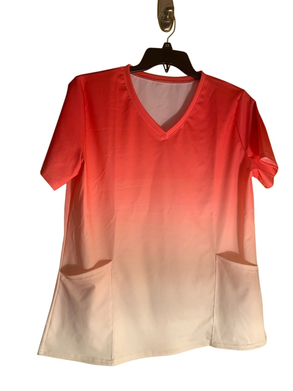 Coral and peach nurse scrub top size XL  NWOT